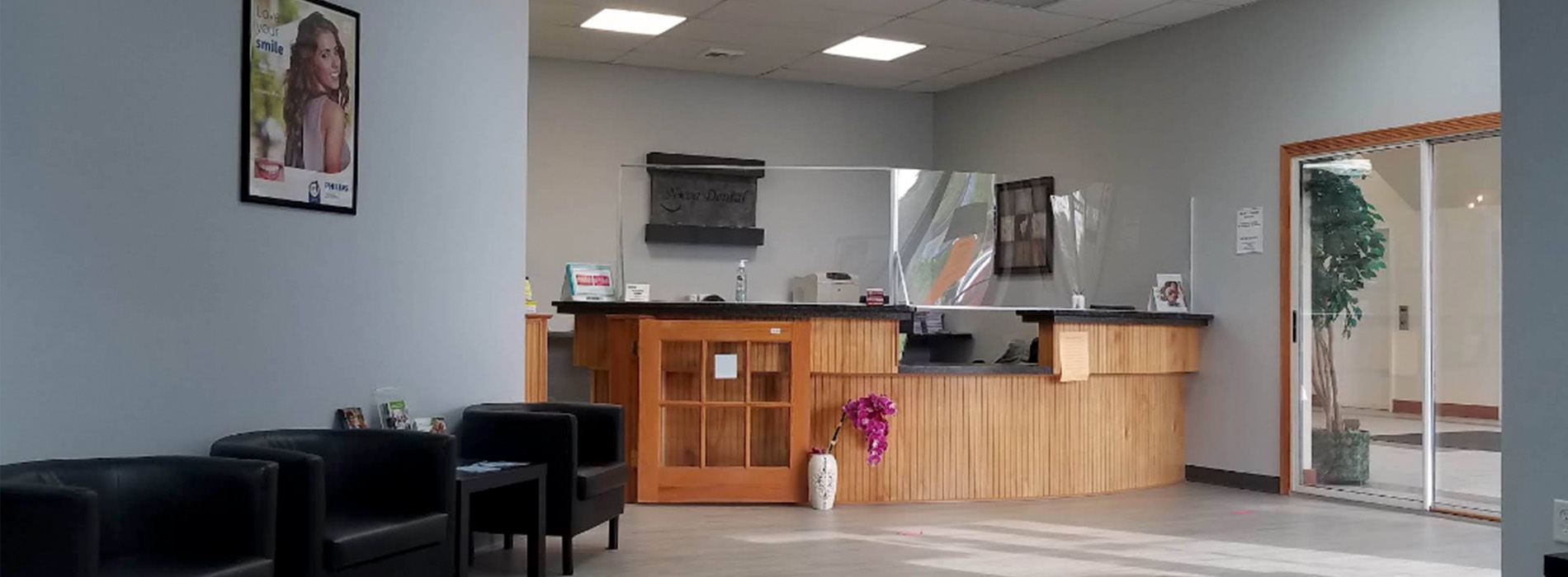 The image shows an interior view of a hair salon with a reception desk and chairs visible through the window.